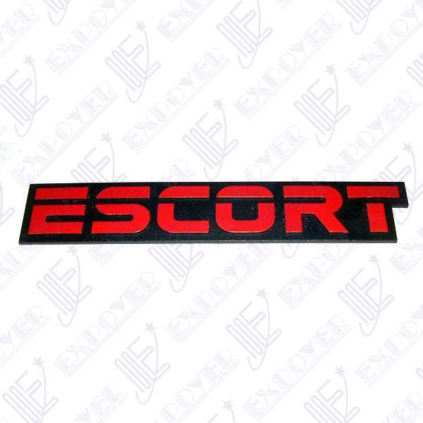 EMBLEMA ESCORT EN BAUL (ROJO)    ESCORT 88/94